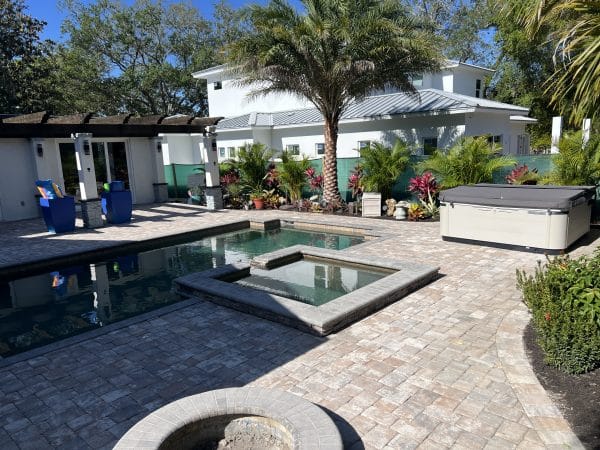 Pool deck cleaning 1671 North Drive Sarasota Fl Paver Seal and driveway clean after photo (3)