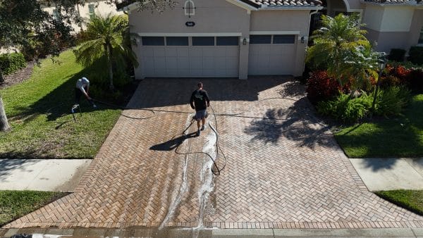 property maintenance residential pressure washing etc services for realtors person pressure washing driveway