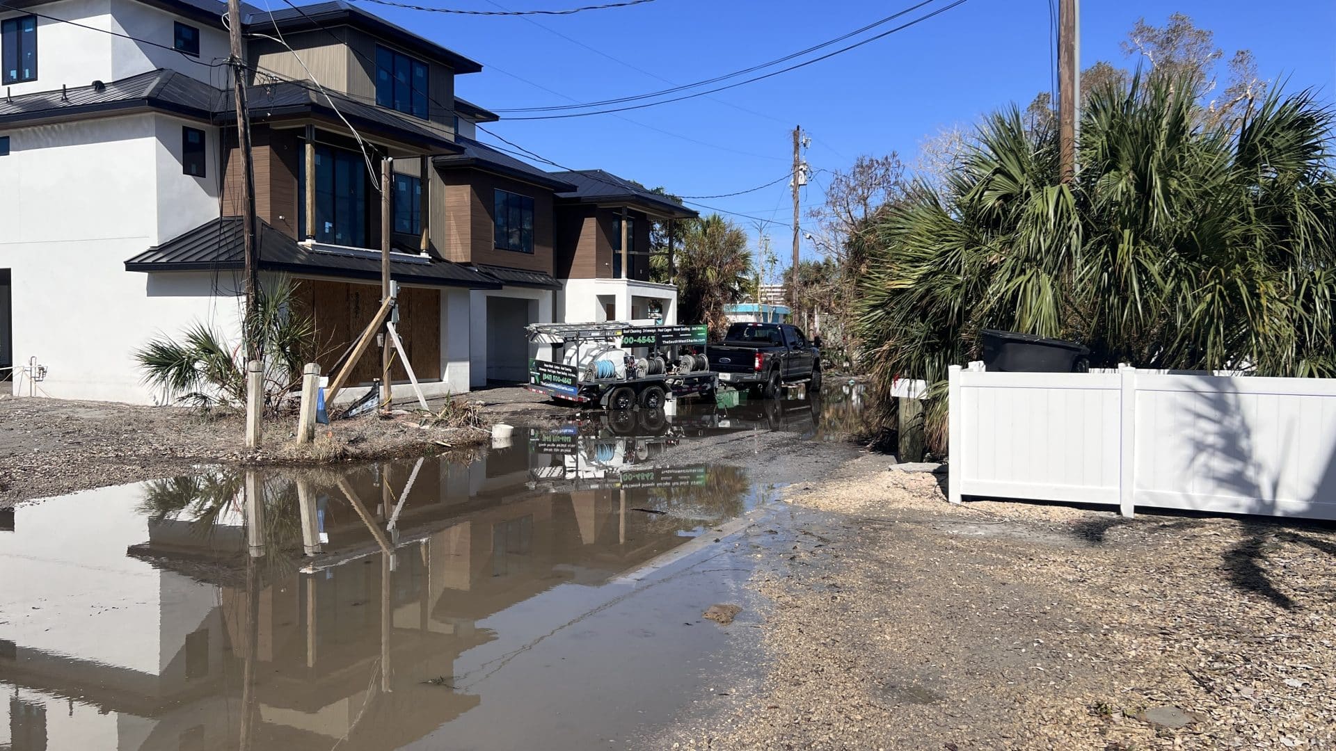 SWS Truck and trailer on hurricane debris road